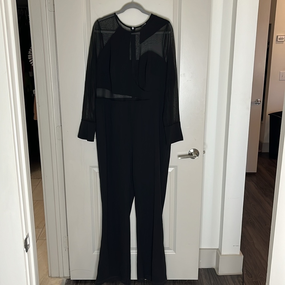 Ladies Zip Up Jumpsuit With A Hint Of Sheer. - image 2